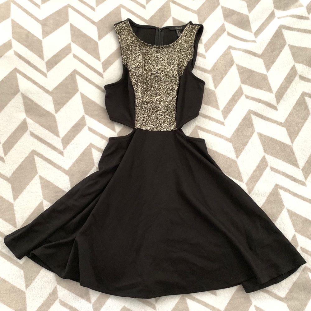 Black and Gold dress with side cuts
